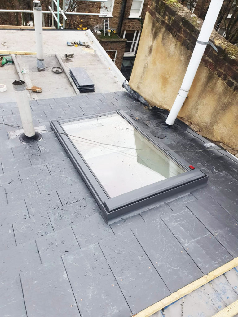 Velux window and natural slate roof