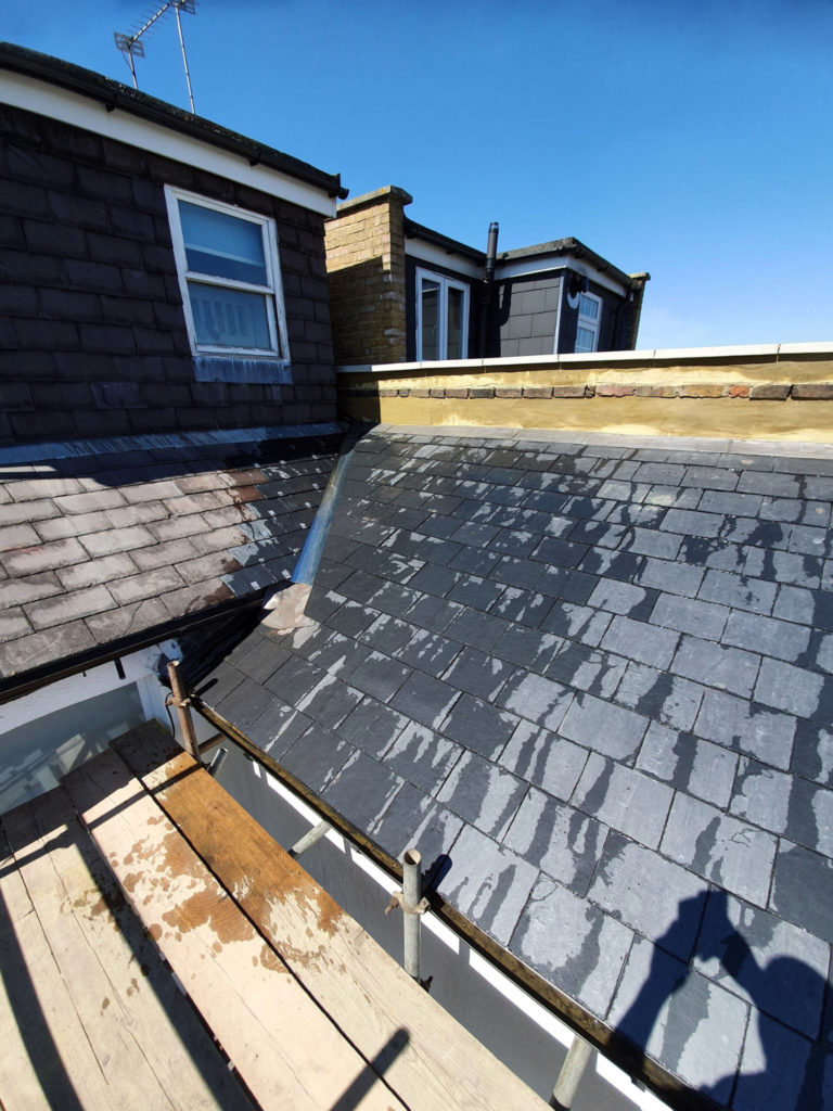 Re-roof natural slate with new valley